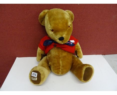 1966 Large sized Merrythought Winnie the Pooh bear with registered design label to foot in very good condition, with hand kni