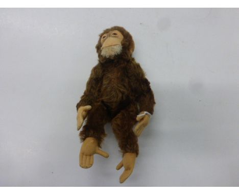 Vintage Steiff "Jocko" mohair monkey in good original condition, missing button but prong marks to ear, approx 11" tall