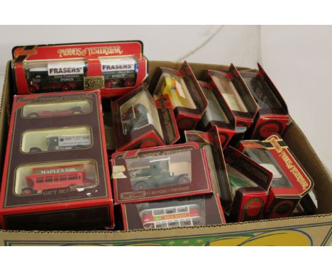 Collection of boxed Matchbox diecast model vehicles in red boxes (approx 50)
