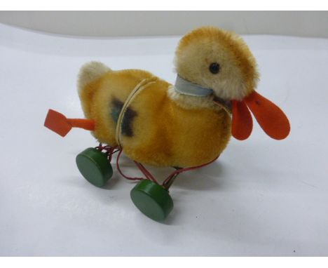 14cm Stieff Duck on wheels c1965-1967 with button tag and chest tag in good condition 