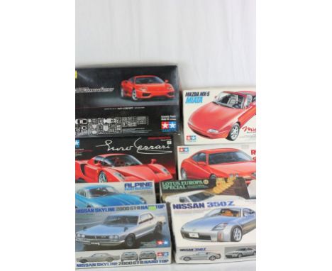 Eight boxed and unbuilt Tamiya plastic model kits to include Nissan 350Z, Alfa Romeo GTV, Mazda MX-5, Nissan Skyline 2000 GT-