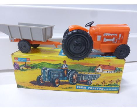 Boxed Telsalda J0020 Farm Tractor with trailer friction powered motor, good condition in good box