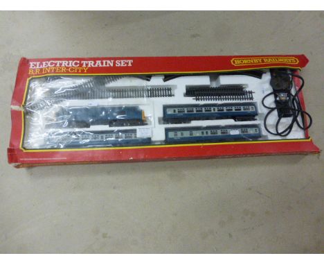 Boxed Hornby R696 BR Intercity Set containing engine and rolling stock x 3 etc, near complete, damaged box
