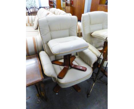 A CREAM HIDE UPHOLSTERED SWIVEL ARMCHAIR, ON FOUR SPLAYED LEGS AND THE MATCHING POUFFE 