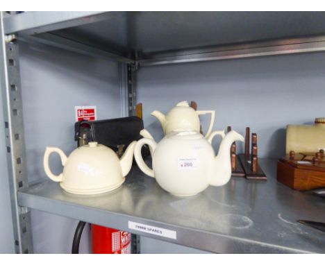 THREE POTTERY TEAPOTS AND A COFFEE POT, THREE OAK PHOTOGRAPH FRAMES AND A KODAK CAMERA 