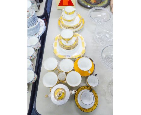A GLADSTONE CHINA PART TEA SERVICE WITH YELLOW AND GILT DECORATION AND AN ALLERTONS TEA SERVICE FOR 12 PERSONS 
