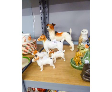 A SET OF FOUR BESWICK JACK RUSSELL FIGURINES AND A MELBA EXAMPLE (5) 