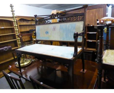 A VICTORIAN MAHOGANY AND INLAID BENCH, HAVING PIERCED TOP RAIL OVER PAD SEAT, ON SQUARE FLUTED SUPPORTS (A.F.)