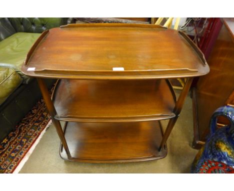 An Ercol Golden Dawn elm and beech Windsor trolley 