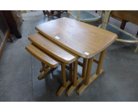 An Ercol Blonde ash nest of tables 