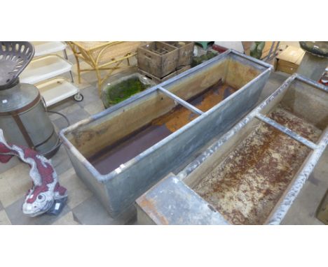 A large galvanised trough 