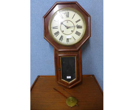 An American mahogany 8-day Waterbury wall clock 