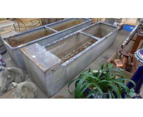 A large galvanised trough 