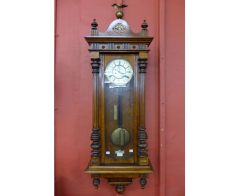 A 19th Century walnut double weight Vienna wall clock 