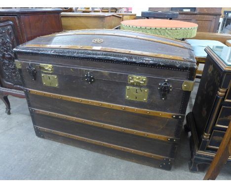A vintage French dome topped trunk 