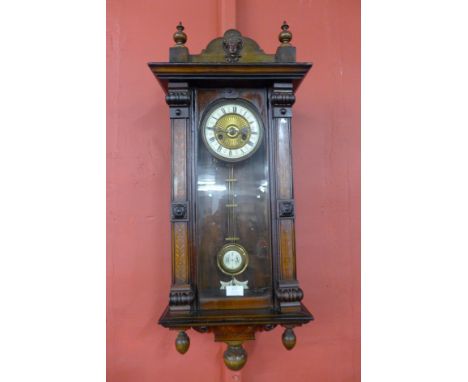 A 19th Century inlaid walnut Vienna wall clock 