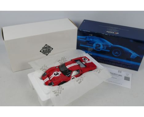 Exoto - Racing Legends - A boxed 1:18 scale Ford GT40 MkIV in red celebrating 100 years of Ford Racing # 18044. The model app