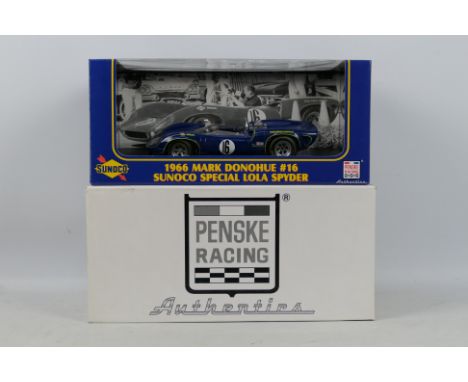 GMP - A boxed 1966 Mark Donohue number 16 Sunoco Special Lola Spyder in 1:18 scale, one of only 3504 produced # 12002. The mo