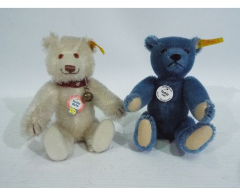 Steiff - Two Steiff bears, White bear 029622 & blue bear 029233 approx 16 cm (h). Each with gold Steiff button and yellow lab