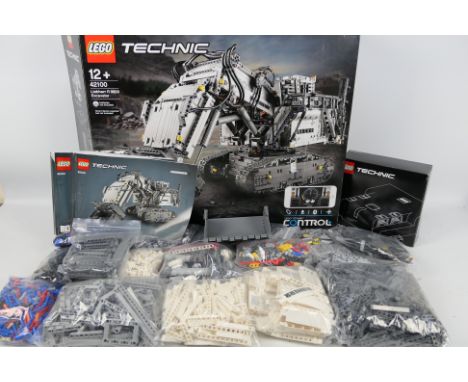 Lego  - Lego Technic Liebherr R 9800 Excavator  #42100. Box is open with manual 1 and 2 and internal white box. The pieces ha