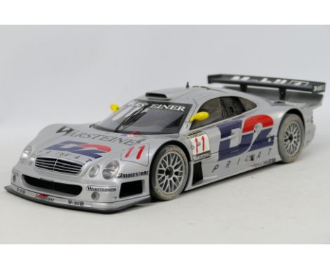 Autoart - A boxed limited edition 1:12 scale Mercedes Benz CLK GTR FIA GT1 Champion, it is number 4864 of 9999 produced. The 