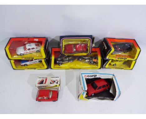 Corgi - 8 x boxed 1980s models including Team Lotus gift set # 32, Jaguar XJ-S # 314, MG Maestro # 1009, Rover 3500 Police ca