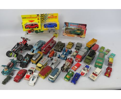 Corgi Toys - Dinky Toys - Matchbox. In excess of 30 loose and boxed diecast models ranging from Playworn to Excellent conditi