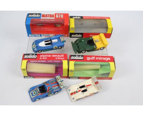 Solido - 4 x boxed models,  #13 Matra 670 Courte, #20 Alpine Renault both appear Near Mint in Fair to Good boxes, one has a t