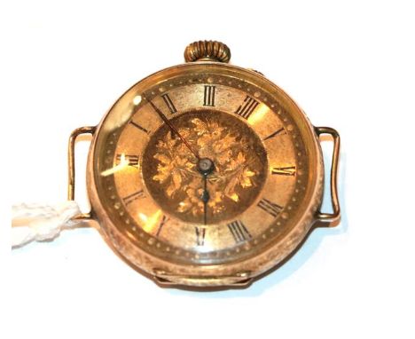A lady's Continental wristwatch stamped 14k with engine turned decoration