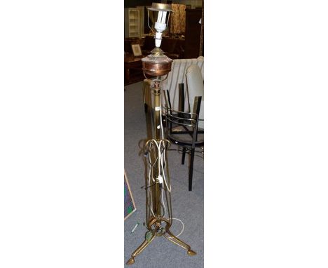 A brass Art Nouveau standard lamp, converted to electric 