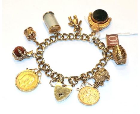 A charm bracelet, stamped '9' and '.375', hung with ten charms including a teddy bear, a barrel, an 1897 half sovereign, a 19