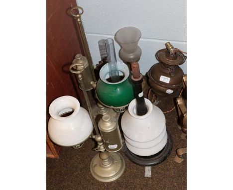 Pair of brass desk oil lamps and glass shades, a wall mounted copper oil lamp and bracket, two other lamps 