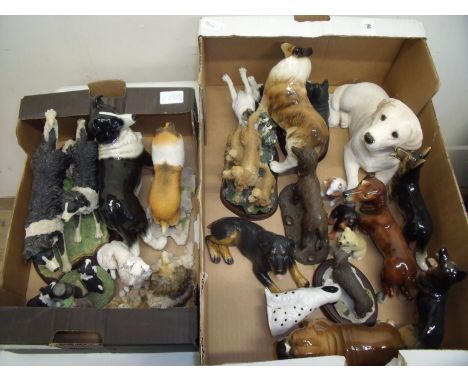 Large selection of decorative ceramic and other dog figures in two boxes 