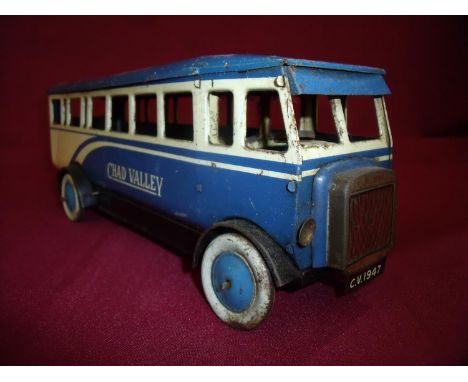 Chad Valley tin plate clockwork single decker bus in blue and cream detail registration C.V.1947 