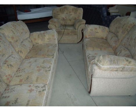 Three piece suite comprising of three seat sofa, two seat sofa. electric reclining armchair and a matching footstool &nbsp;