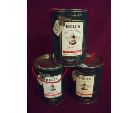 Three cased Bells Christmas commemorative whisky decanter sets 1989, 1990 &amp; 1991 