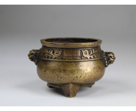 Signed, Bronze Chinese Footed Censer with twin foo dog masks on either side. Diameter: 3 inches.