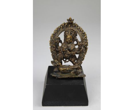 Early Antique Tibetan Bronze Mahakala Figure on stand. Mounted on wooden base. Possibly 13th-14th century. Height: 5 inches (