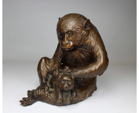 Signed, Japanese Meiji Period Bronze Monkey holding a younger monkey. Incised on Base. Height: 9 inches.