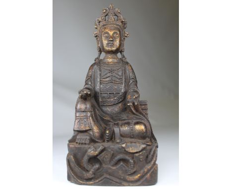 Chinese Ming Dynasty Gilt Bronze Seated Buddha Figure with mongoose near base. Height: 9.25 inches.