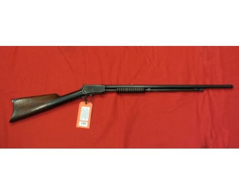 A Winchester .22 r/f model 1890 pump action rifle, this rifle is the takedown model with S/No. 40803, this item can only be p