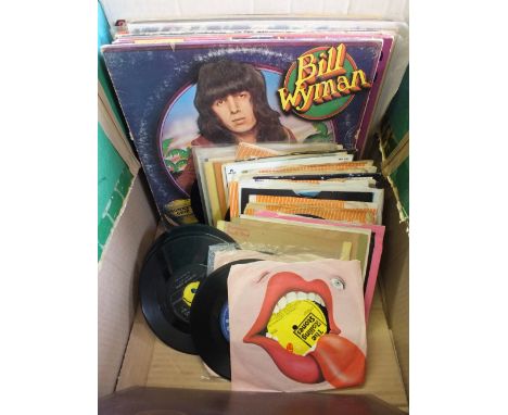 A large quantity of Rolling Stones, Carpenters LP's and singles including early issue