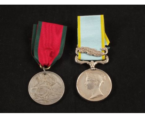 A Crimea medal with Sebastopol bar to J.Warr 4th Light Dragoons with British 'Turkish' Crimea medal, with copy research