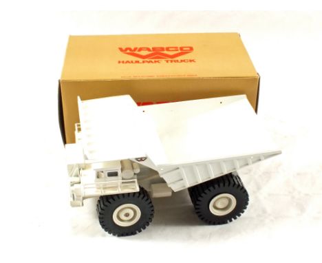 A boxed Conrad 1-50 scale die cast white Wabco Haulpak truck, made in West Germany