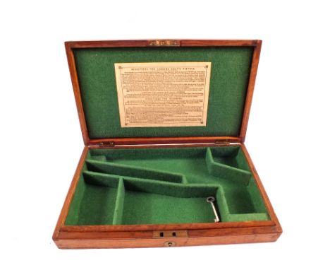 An Oak gun case with later fitted interior for a Colt revolver, with re-print of 'directions for loading colts pistols'