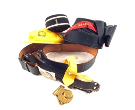 A collection of belts and hats including Boy Brigade and Salvation Army examples