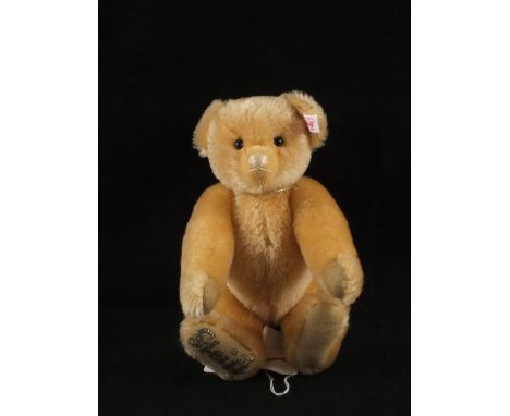 A Steiff cream mohair bear 661976 in bag