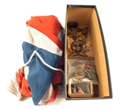A mixed lot including small arms manual, badges and a Union flag etc