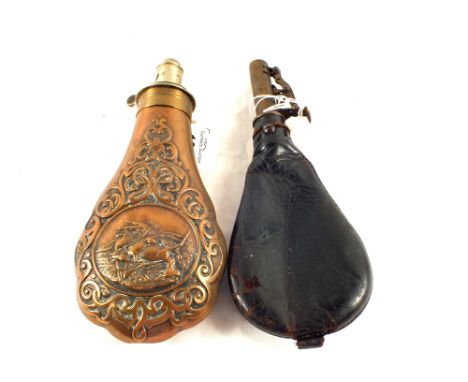 A good Dixon & Sons Copper powder flask embossed with game (circa 1850) with a leather shot flask