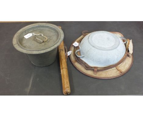 A WWI era wash basin with wooden stand and a 1916 dated galvanized pot with lid